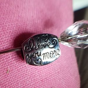 Hallmark "Love you more" charm.